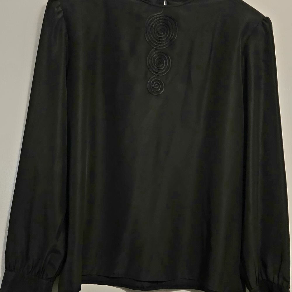 Elegant Black Blouse with Spiral Detail
